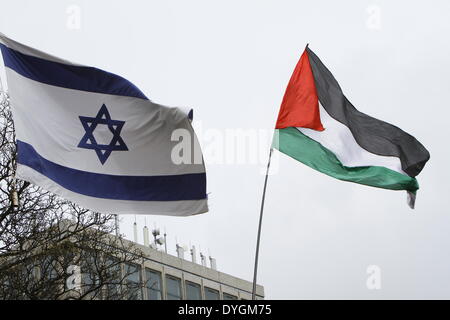 Dublin, Ireland. 17th April 2014. A Palestinian flag flies next to the Israeli flag. Pro-Palestinian activists assembled outside the Israeli Embassy in Dublin, to commemorate the 5th anniversary of Bassem Abu Rahmah. The Bil'in resident was killed in the West Bank village during a protest after being hit by a tear gas canister. Credit:  Michael Debets/Alamy Live News Stock Photo