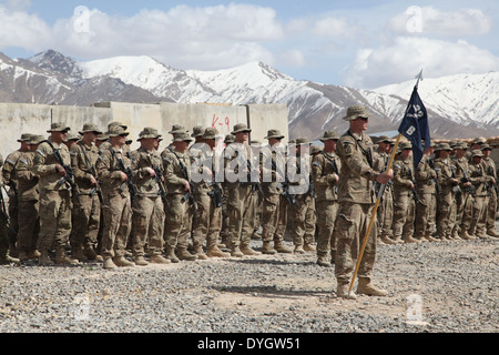 US Soldiers with the 10th Mountain Division stand at attention before an award ceremony held at Forward Operating Base Sultan Kheyl April 16, 2014 in Wardak province, Afghanistan. Stock Photo