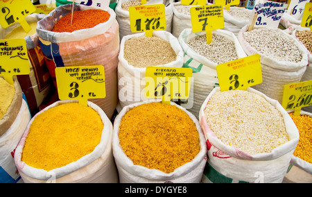 Organic Dry Cracked Corn Kernels, Beans, Lentil, And Wheat In Sacks At A Street Market Stock Photo