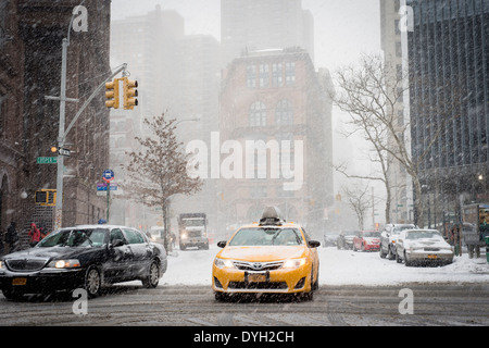 Traffic in a snow storm in lower Manhattan, New York City, NY. USA Stock Photo