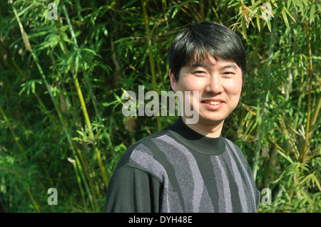 chinese young man in nature Stock Photo