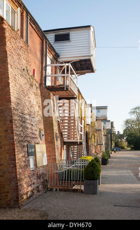 Nineteenth century industrial buildings converted to leisure, shopping, housing, cultural use, Snape Maltings, Suffolk, England Stock Photo
