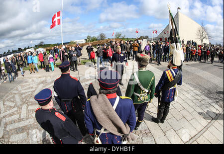 Sonderborg, Denmark. 18th Apr, 2014. Soldiers in historic uniforms take part in the ceremony to mark the 150th anniversary of the Battle of Dybbol in Sonderborg, Denmark, 18 April 2014. 150 years ago, the Germans and Danes fought over Schleswig-Holstein. The war climaxed with the Battle of Dybbol. The anniversary on 18 April will be widely celebrated in Denmark. Photo: AXEL HEIMKEN/dpa/Alamy Live News Stock Photo