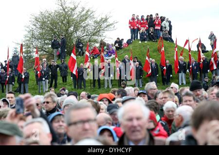 Sonderborg, Denmark. 18th Apr, 2014. People take part in the ceremony to mark the 150th anniversary of the Battle of Dybbol in Sonderborg, Denmark, 18 April 2014. 150 years ago, the Germans and Danes fought over Schleswig-Holstein. The war climaxed with the Battle of Dybbol. The anniversary on 18 April will be widely celebrated in Denmark. Photo: BODO MARKS/dpa/Alamy Live News Stock Photo