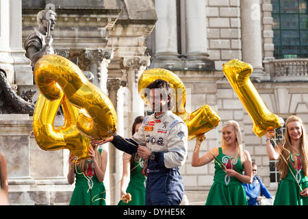 City Hall, Belfast, Northern Ireland, UK. 17th April 2014. Circuit of Ireland Rally 2014. Driver Stephane Consani (Peugeot) selects his position by picking a numbered balloon prior to the start. Credit:  J Orr/Alamy Live News Stock Photo