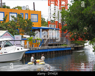 Isla Culebra Puerto Rico USA territory two men in dingy in canal Stock Photo