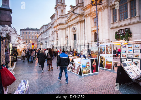 Rome,Italy-March 15,2014:street artists selling paintings and portraits for tourists in Piazza Navona in Rome during the twiligh Stock Photo
