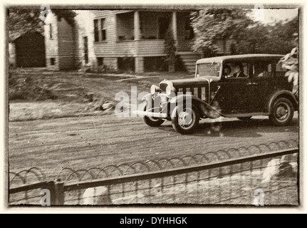 Woman driving car, circa 1940 Stock Photo