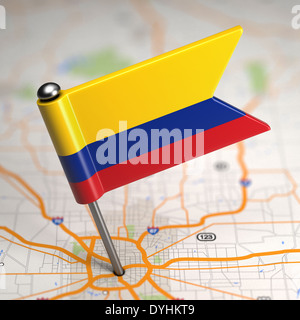 Colombia Small Flag on a Map Background. Stock Photo