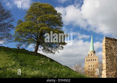 The castle mound in Oxford city centre with  the tower of Nuffield College in the background