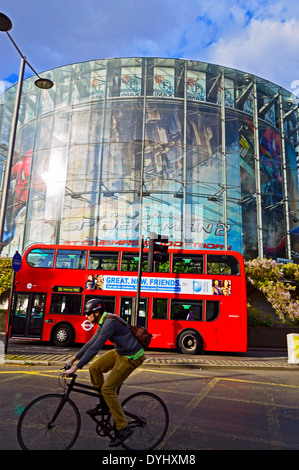 The BFI London IMAX cinema, north of Waterloo Station showing double-decker bus and cyclist, London, England, United Kingdom Stock Photo