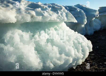 Canada, Nunavut Territory, Vansittart Island, Icebergs from drifting pack ice grounded at low tide along coastline Stock Photo