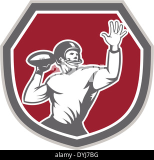 Illustration of an american football gridiron quarterback player throw ball facing front set inside crest shield on isolated bac Stock Photo