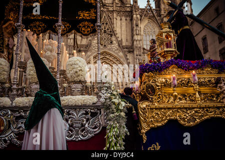 Barcelona, Spain. April 18th, 2014: The two floats of the brotherhood of the 'Gran Poder and Macarena Esperanza' meets during the Good Friday procession in front of Barcelona's cathedral Credit:  matthi/Alamy Live News Stock Photo