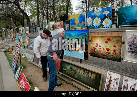 Paintings for sale in the 'Dry Bridge Bazaar' Flea market in Tbilisi capital of the Republic of Georgia Stock Photo