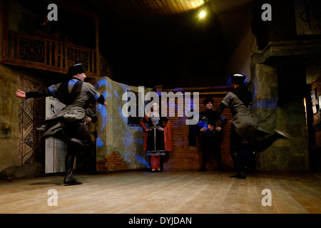 Traditional Caucasian folk dance performance in 'Shadow of Metekhi' restaurant in Tbilisi capital of the Republic of Georgia Stock Photo