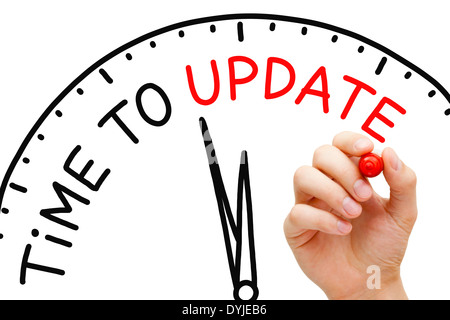 Hand writing Time to Update concept with red marker on transparent wipe board. Stock Photo