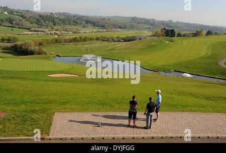 The Celtic Manor Golf and Hotel Resort Complex near Newport in Wales UK - Golfers look across the 18th green of the Twenty Ten course Stock Photo