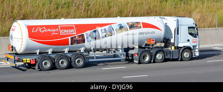 Calor Gas tanker graphics on trailer delivery lorry truck on motorway Hazchem Hazardous material & Chemicals Dangerous Goods warning signs England UK Stock Photo