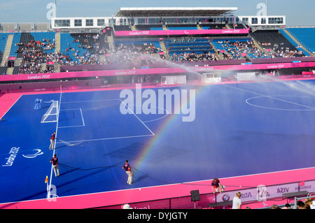 Riverbank Arena in London 2012 Olympic Park Paralympic Games water spraying onto artificial blue grass for 7 aside football in Hackney Wick England UK Stock Photo