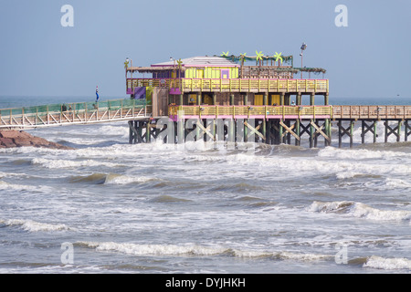 Restaurant and fishing pier in windy weather at Galveston, Texas. Stock Photo