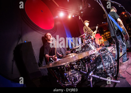 musician playing drums on stage, rock music concert Stock Photo