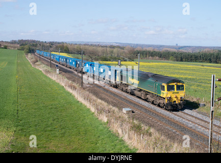 Binliner freight train thought to be used to carry domestic landfill waste from Manchester to Scotland at Plawsworth England UK Stock Photo