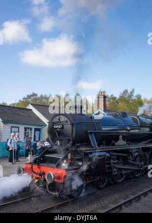 Steam locomotive 45407 'The Lancashire Fusilier' pulling away from Grosmont on the North Yorkshire Moors Railway April 2014 Stock Photo