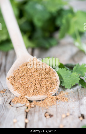 Small Portion of Coriander Powder on a wooden spoon Stock Photo
