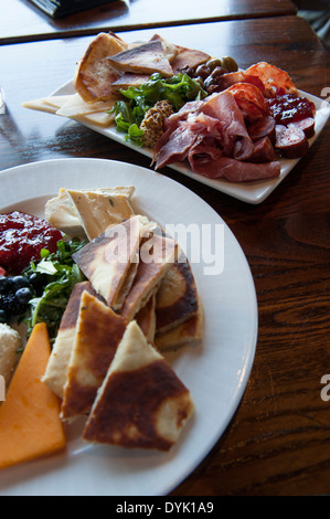 USA Georgia GA Savannah Food Bohemian Hotel charcuterie plate and cheese plate at Rocks on The Roof bar restaurant Stock Photo