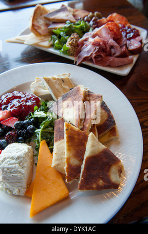 USA Georgia GA Savannah Food Bohemian Hotel charcuterie plate and cheese plate at Rocks on The Roof bar restaurant Stock Photo