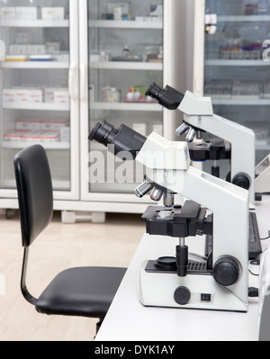 electronic microscopes on the table in a research lab Stock Photo