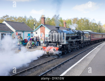 Steam locomotive 45407 'The Lancashire Fusilier' pulling away from Grosmont on the North Yorkshire Moors Railway April 2014 Stock Photo