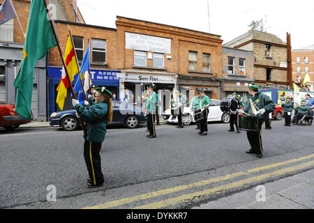 Dublin, Ireland. 21st April 2014. The Flute band Pride of Eireann march past the Republican Sinn Fein offices. Republican Sinn Fein held a commemoration of the 98th anniversary of the Easter Rising of 1916. The party supporters and a colour party marched from the Garden of Remembrance to the General Post office (GPO) for a rally. Credit:  Michael Debets/Alamy Live News Stock Photo