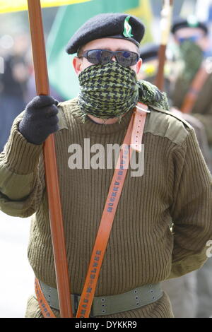 Dublin, Ireland. 21st April 2014. Close-up portrait from a member of the  Republican Sinn Fein colour party. Republican Sinn Fein held a commemoration of the 98th anniversary of the Easter Rising of 1916. The party supporters and a colour party marched from the Garden of Remembrance to the General Post office (GPO) for a rally. Credit:  Michael Debets/Alamy Live News Stock Photo