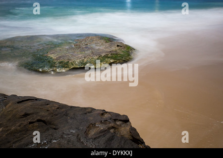 Jibbon Beach in moonlight, Bundeena, NSW Australia Stock Photo