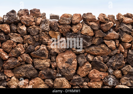 Dry stone wall built withvolcanic rock in the Las Canadas del Teide National park on Tenerife, Canary Islands, Spain. Stock Photo