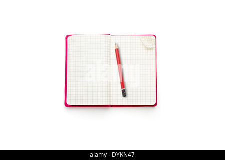 pink blank open diary with red pencil, isolated on white. Stock Photo