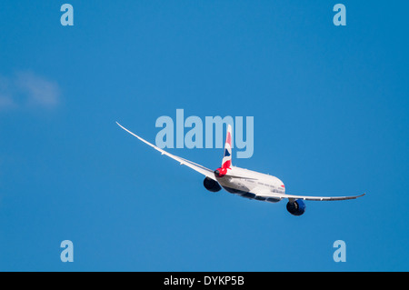 Rear view of a British Airways Boeing 787 Dreamliner plane banking away after taking off