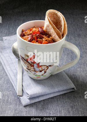 Chilli microwaved in a mug Stock Photo