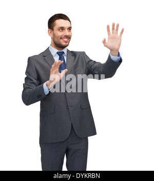 businessman working with imaginary virtual screen Stock Photo