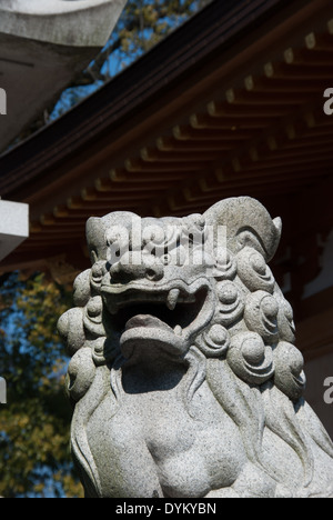 Komainu statue at a temple In Tokyo, Japan Stock Photo