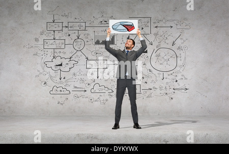 smiling businessman with white board with diagram Stock Photo