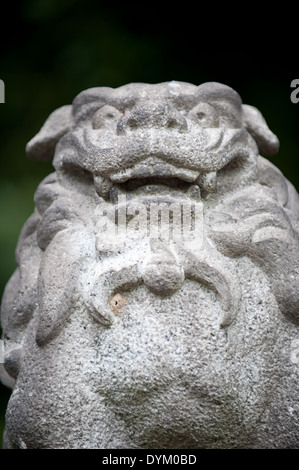 Komainu statue at a temple In Tokyo, Japan Stock Photo