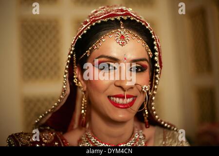 New Delhi, India. 21st Apr, 2014. The bride waits for her groom during her traditional wedding in New Delhi, India, April 21, 2014. © Zheng Huansong/Xinhua/Alamy Live News Stock Photo