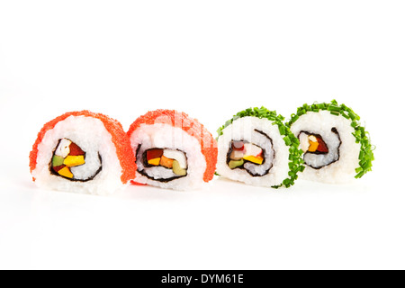 Four luxurious sushi rolls isolated on white background. Two rolls decorated with chive and two with caviar. Stock Photo