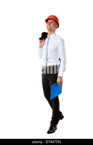 Happy businessman in helmet with blue folder over white background Stock Photo