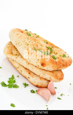 Delicious garlic and coriander naan flatbread with fresh herbs and garlic isolated on white background. Culinary eat asian food Stock Photo