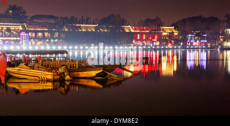 Thousands of locals and visitors of Beijing enjoy night life at Chou-Chai park on the bank of Hou Hai lake  situated right in the center of Chinese capital, on Sunday, April 20th, 2014.  (CTK Photo/Rene Fluger) Stock Photo