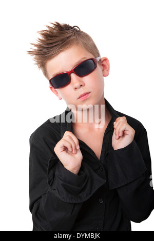 Cool trendy fashionable boy dressed in black dress shirt and sunglasses isolated on white background. Stock Photo
